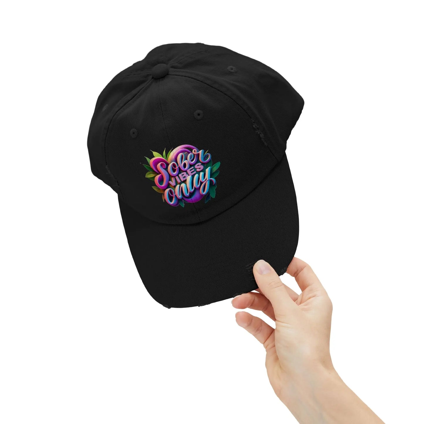Black Trucker Hat with 'Sober Vibes Only' text held by a hand on a white background